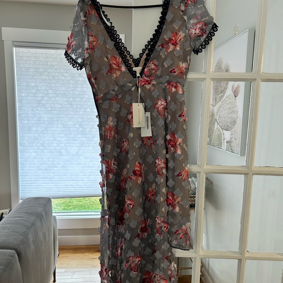 Brand new with tags Foxiedox asymmetrical dress - Picture 2 of 3
